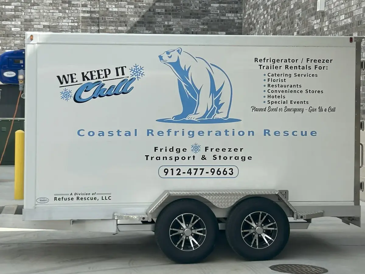 Coastal Refrigeration Rescue mobile refrigerated transport trailer with 'We Keep It Chill' branding and polar bear logo